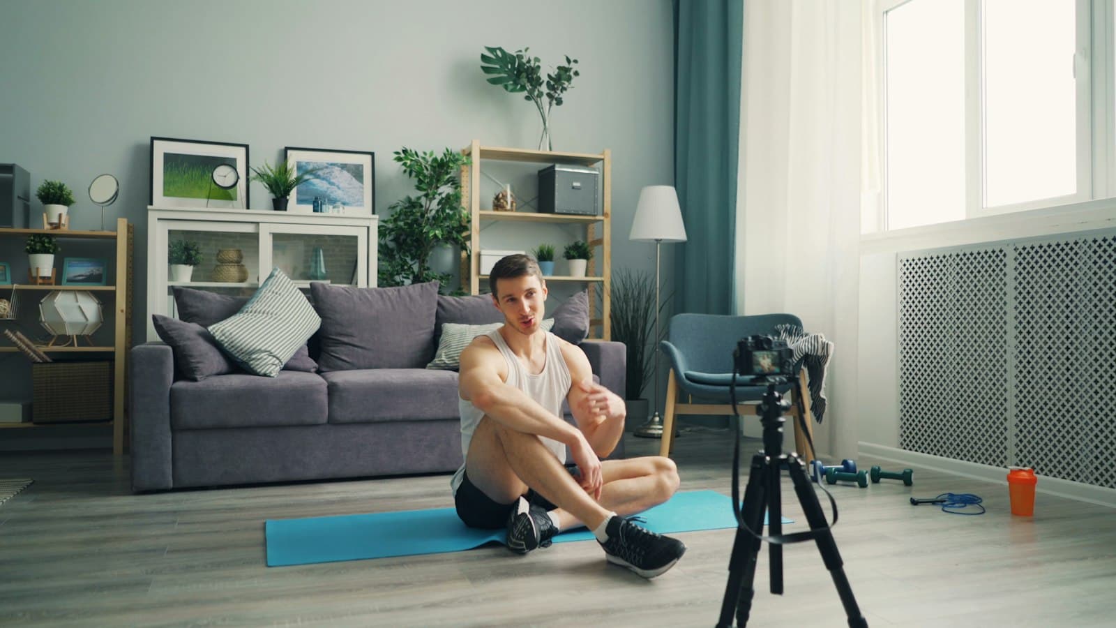 A coach sets up their camera before a live class